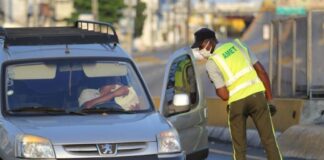 Transportista detenido en toque de queda