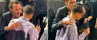 Marc Anthony le canta a niño invidente en concierto